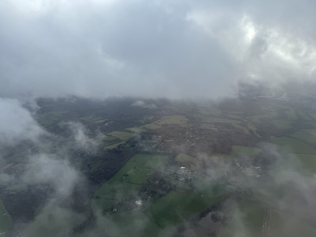 aerial view of a landscape with clouds