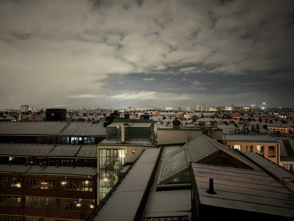 a rooftops of a city at night