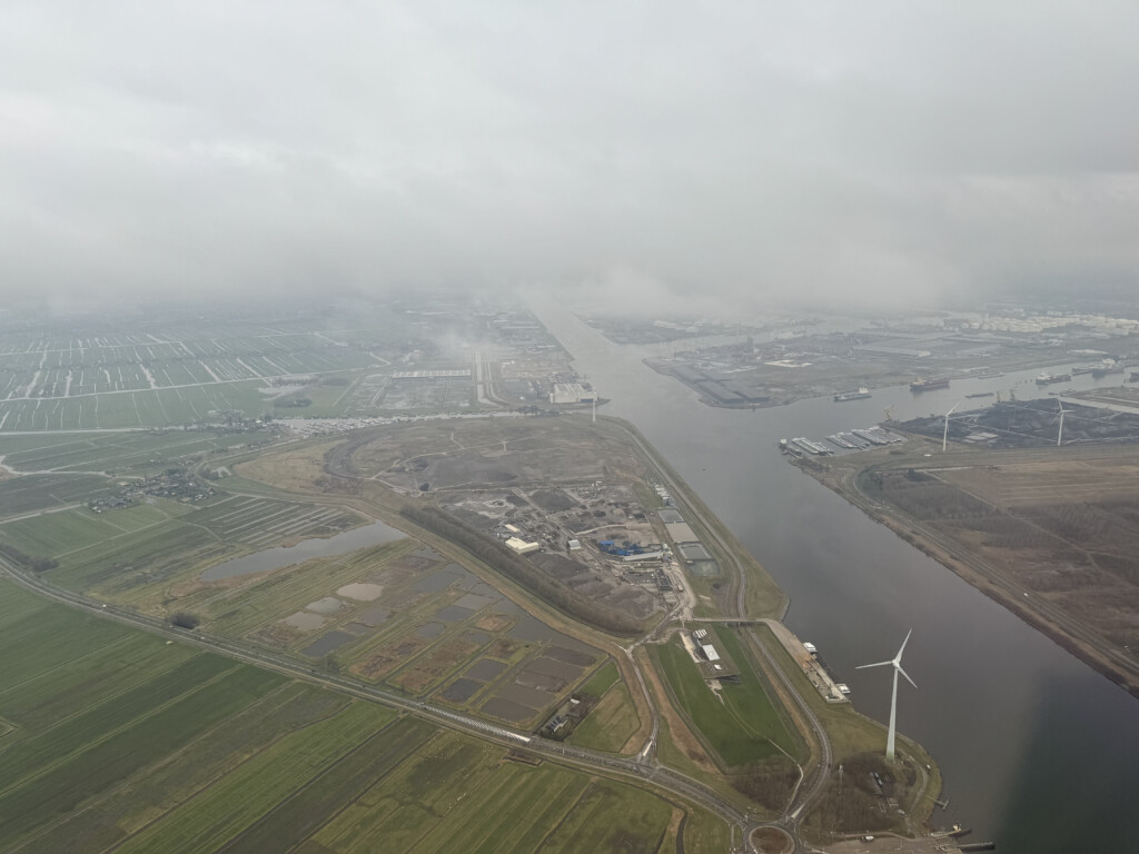 a aerial view of a river and a city