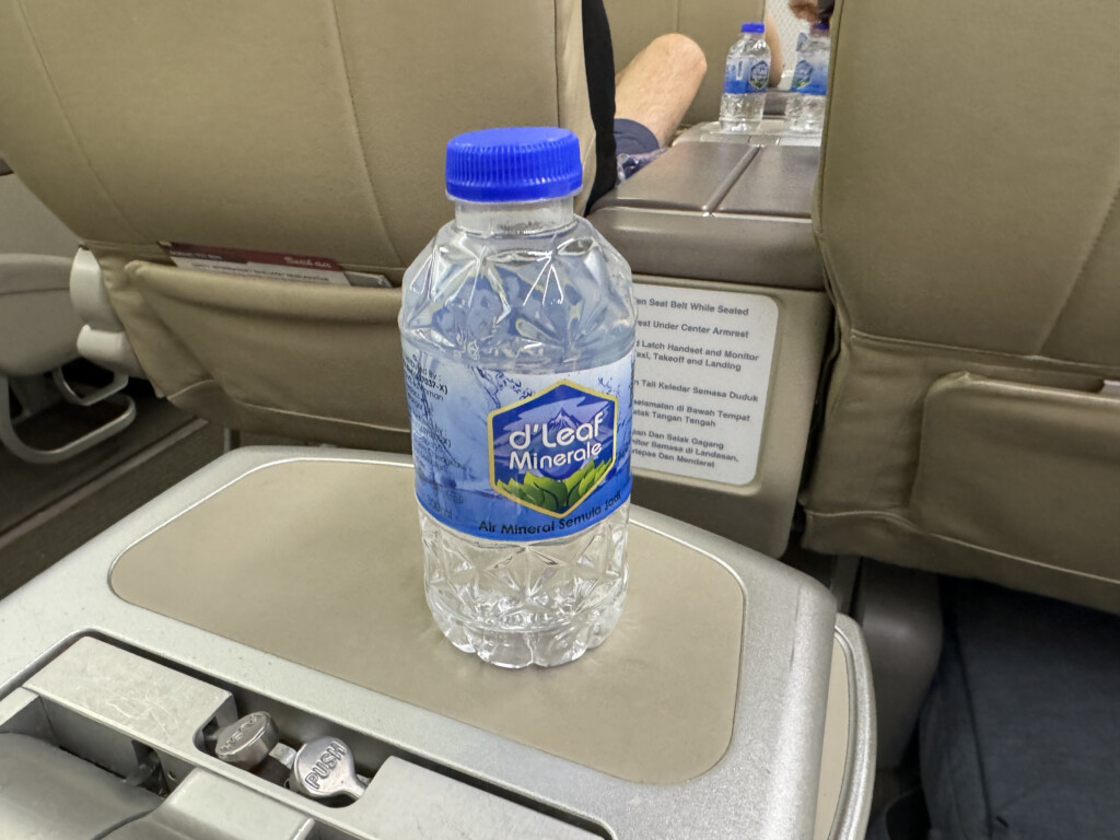 a bottle of water on a tray