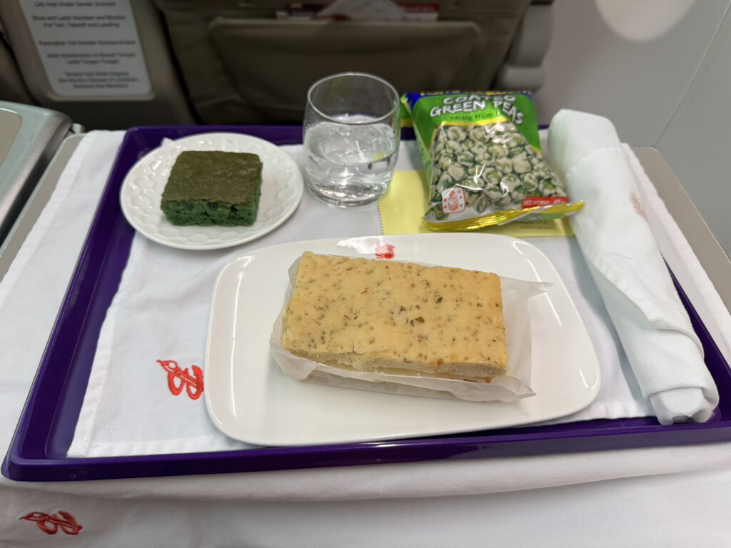 food on a tray on a plane