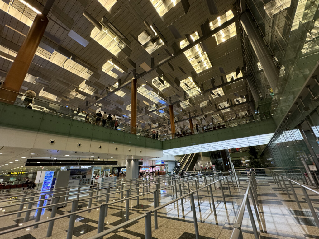 a glass ceiling with people walking on it