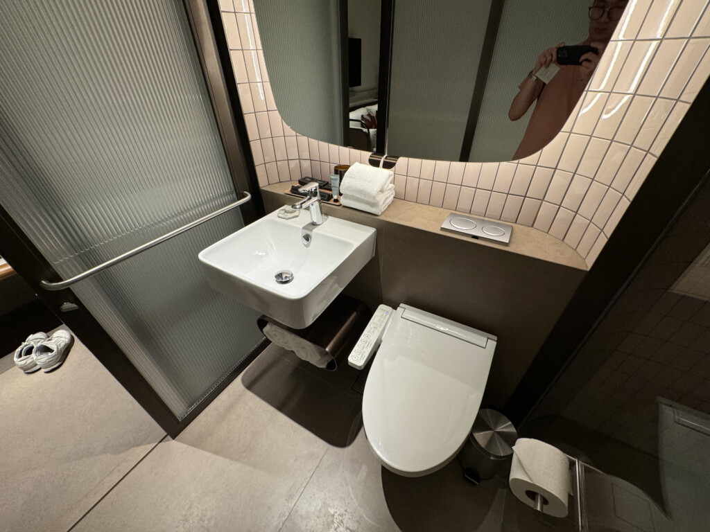 a bathroom with a sink and toilet