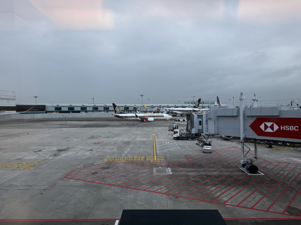 an airport with airplanes on the ground