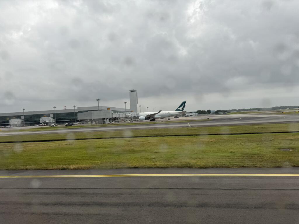 a group of airplanes on a runway