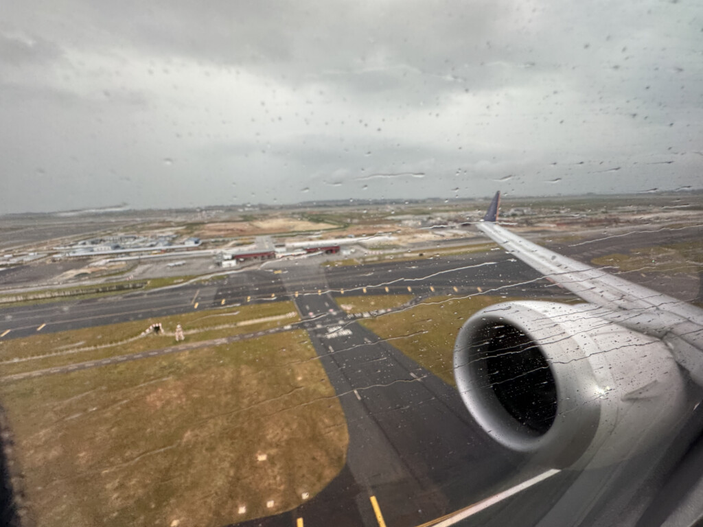 an airplane wing on a runway