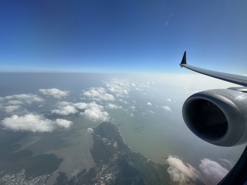 an airplane wing and the sky