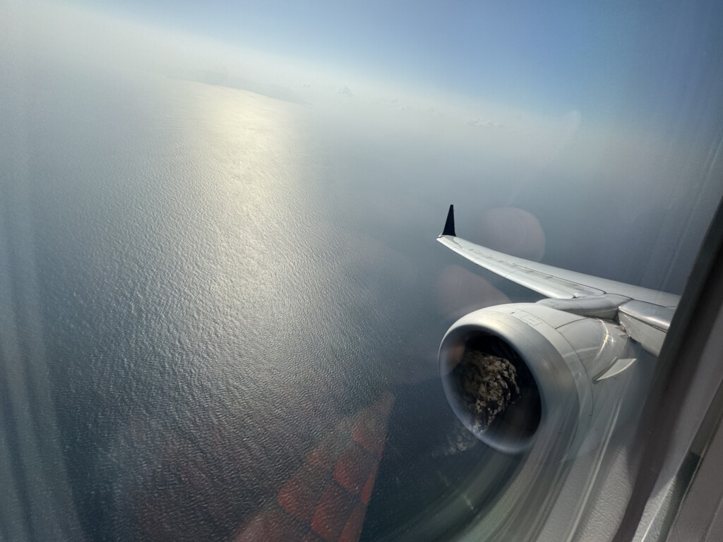 an airplane wing and water