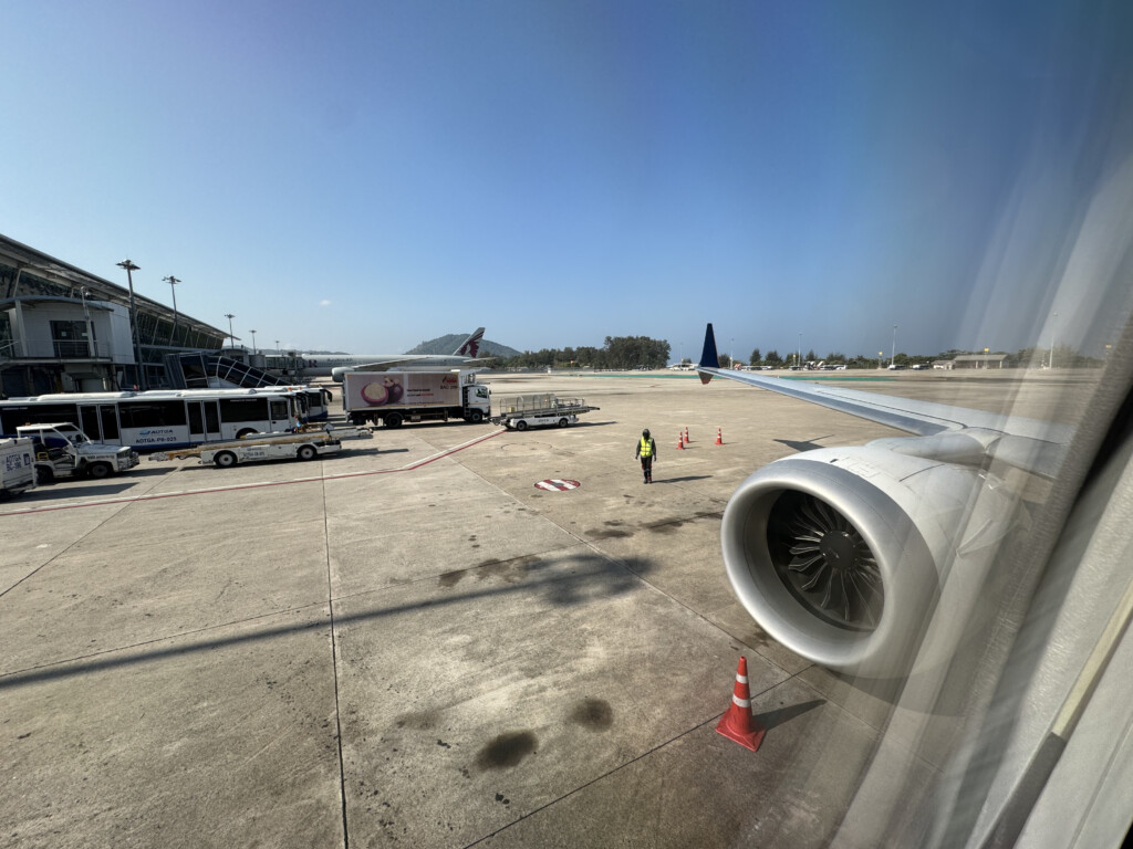 an airplane wing on a runway