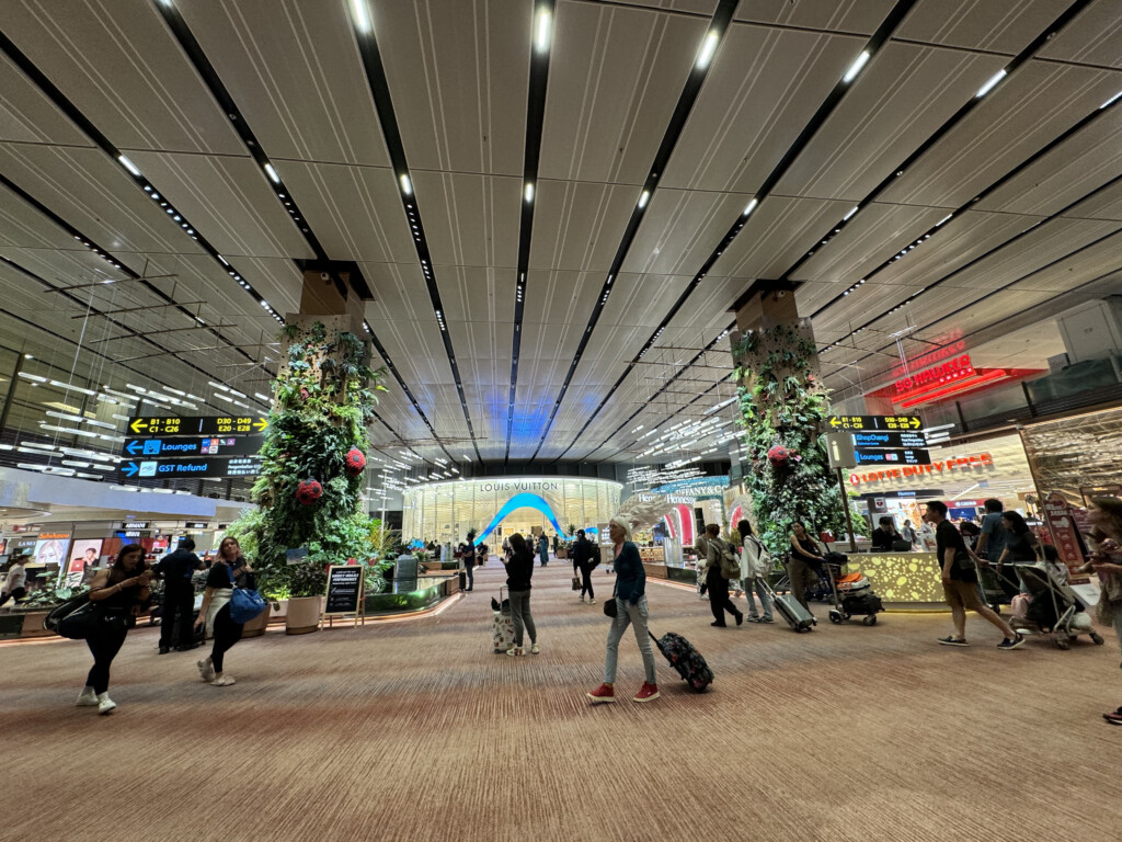 a group of people in an airport