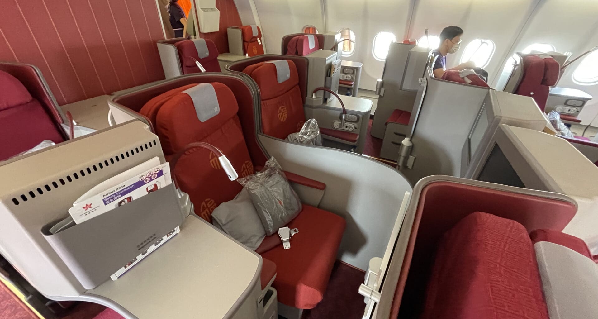 a person standing in the back of a plane