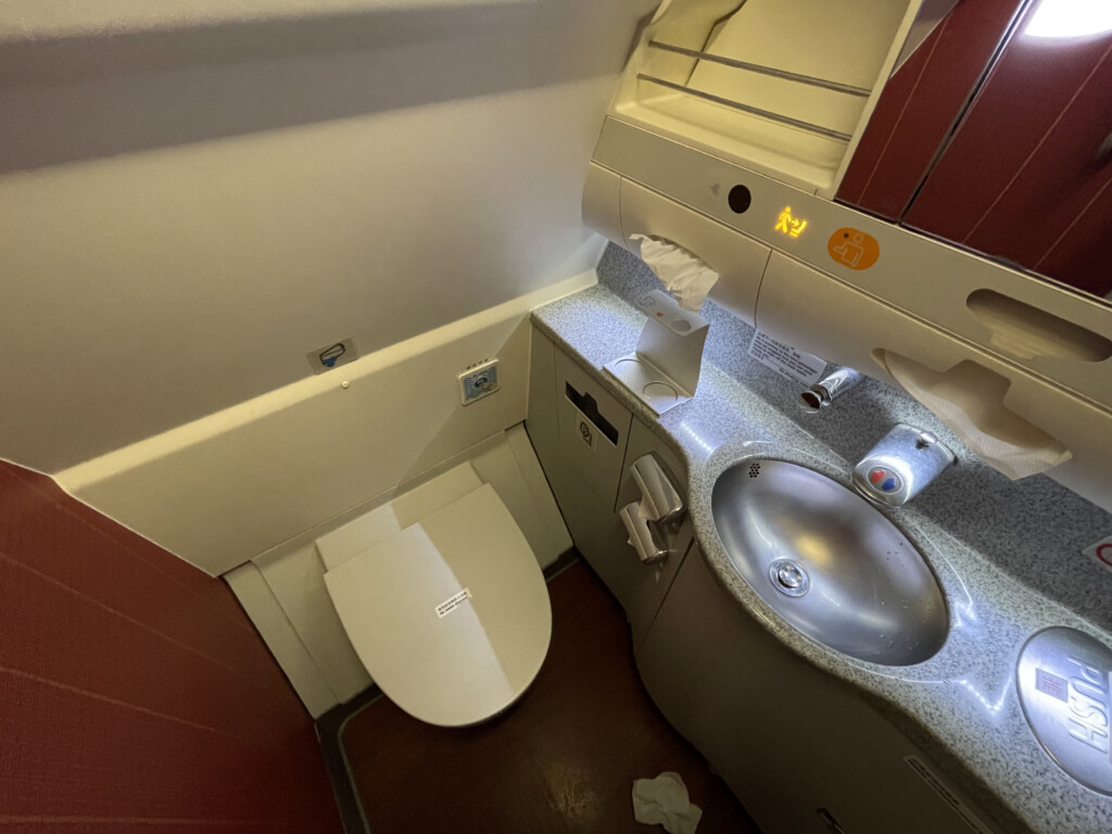 a bathroom with a sink and toilet