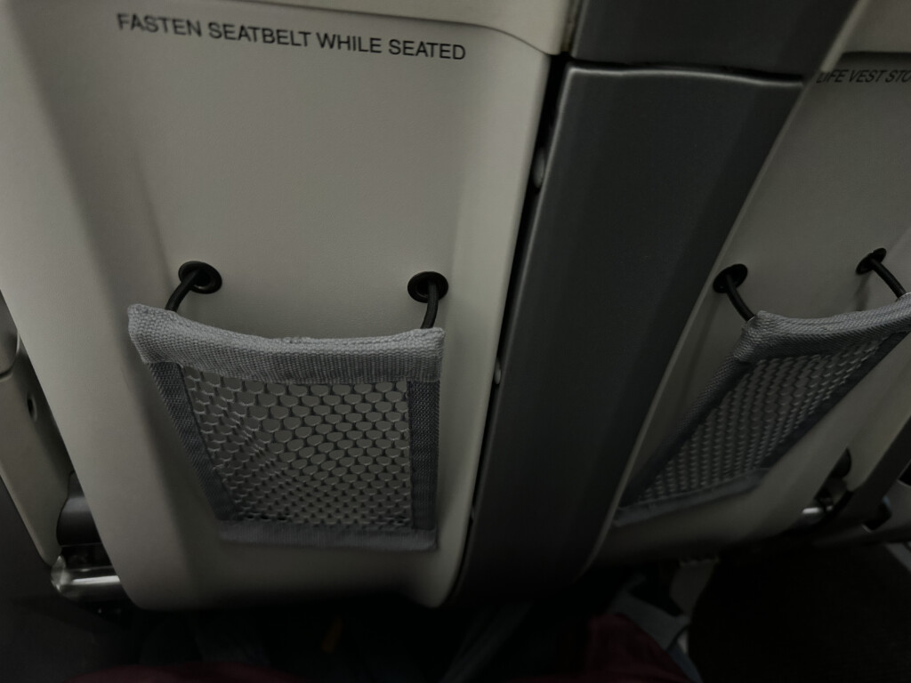 a seat belt on a plane