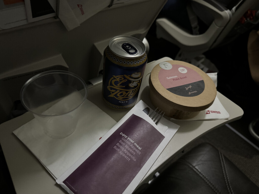 a can and a can of food on a table
