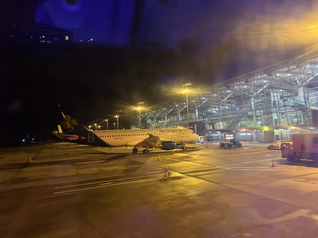 an airplane on a runway at night