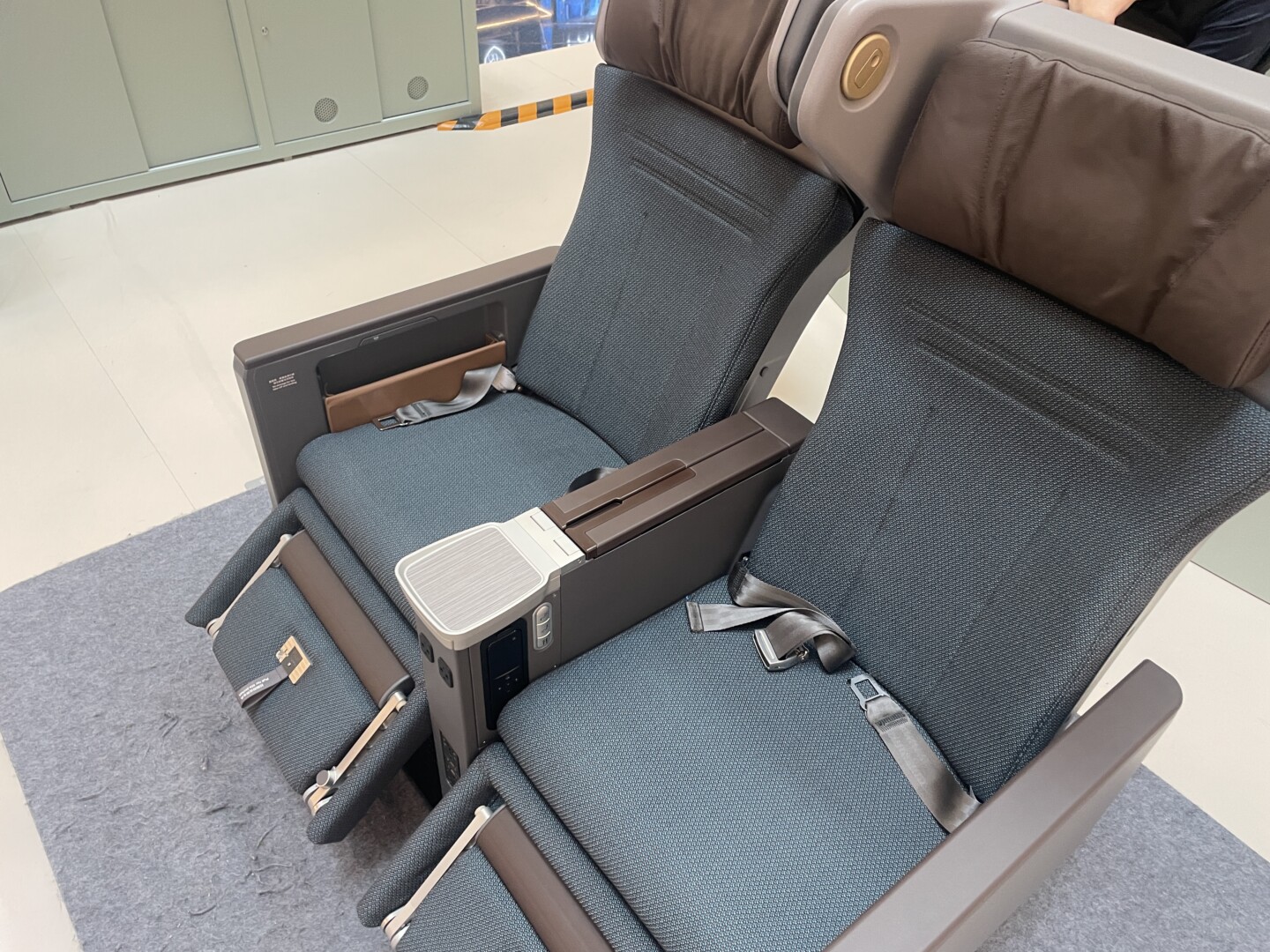 a seat with armrests and arm rest