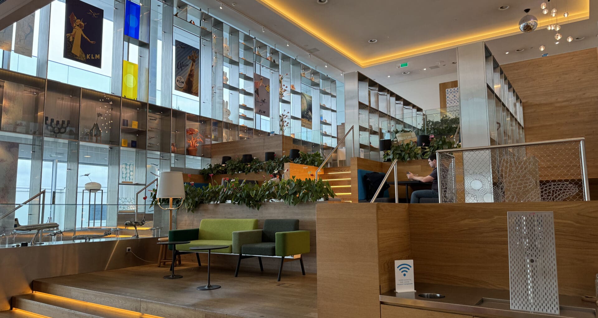 a room with a staircase and chairs