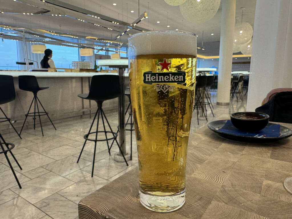 a glass of beer on a table