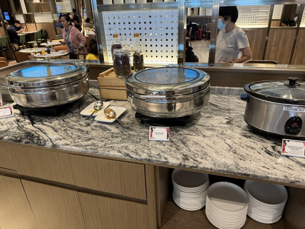 a buffet line with food on the counter