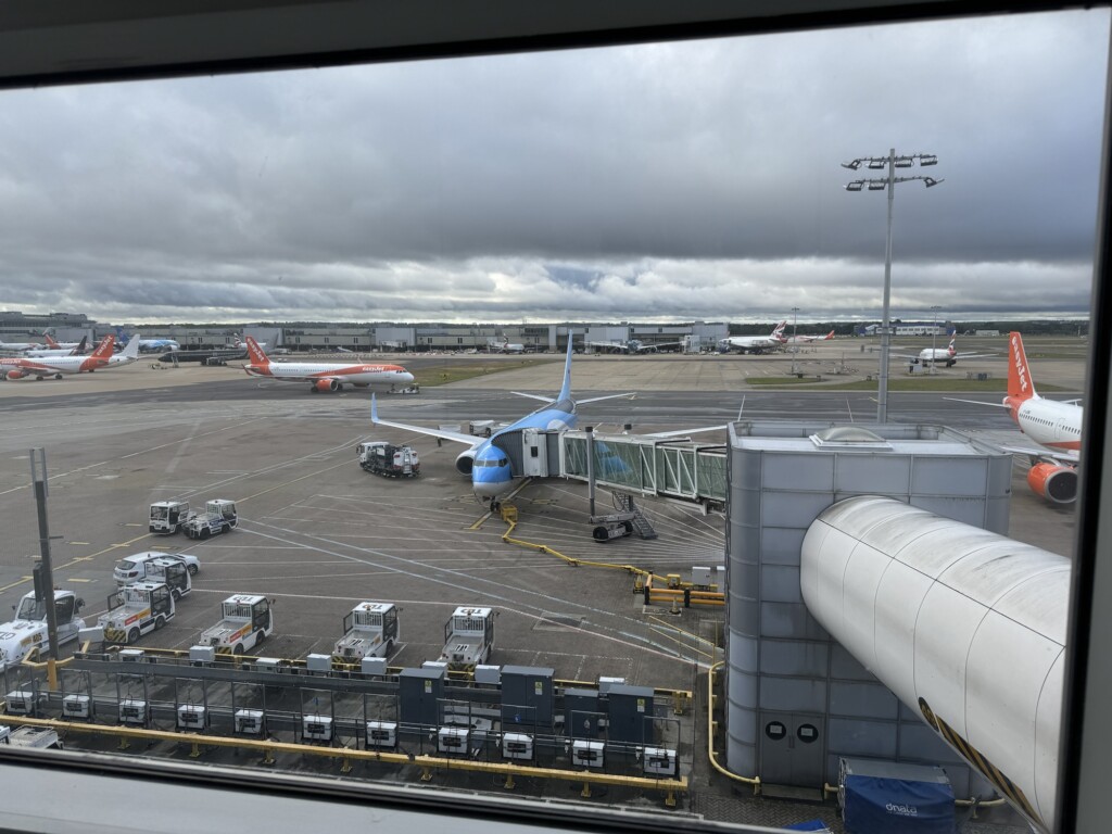 an airport with airplanes parked on the ground