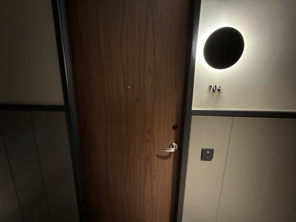 a door with a round light