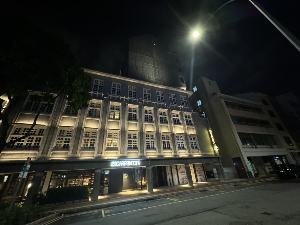 a building with lights on the side of it