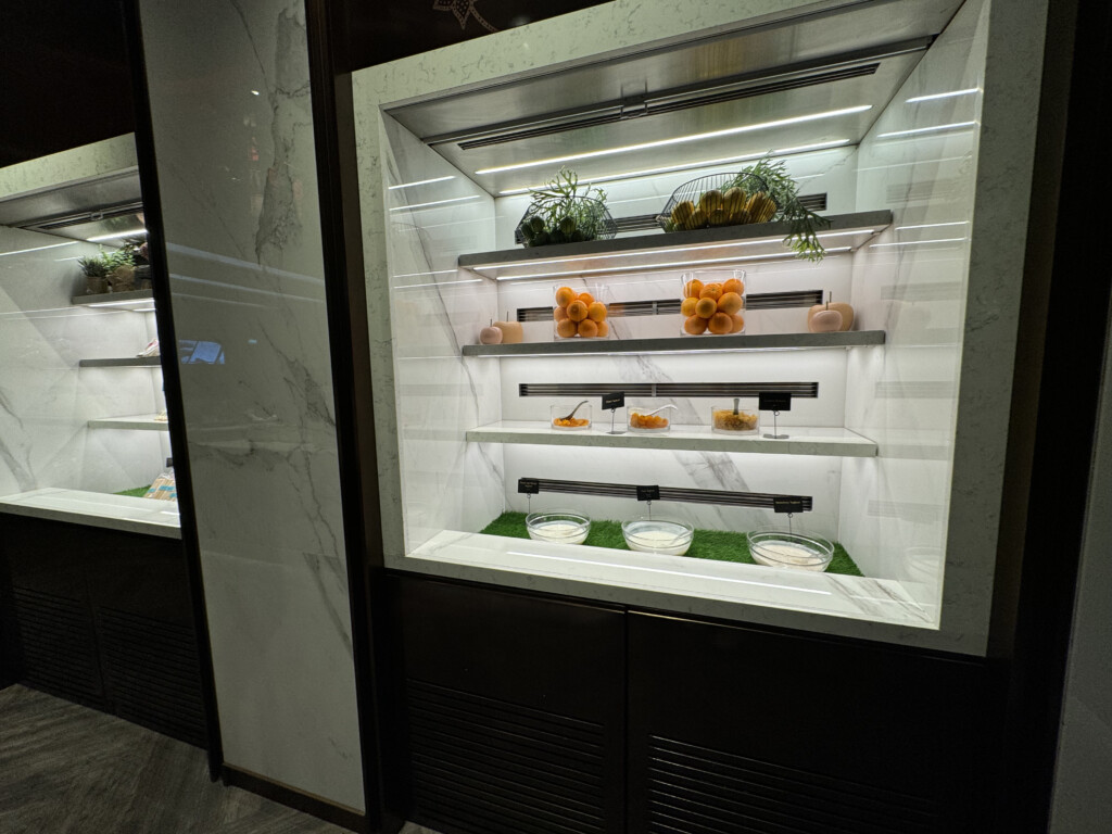 a display case with food on shelves