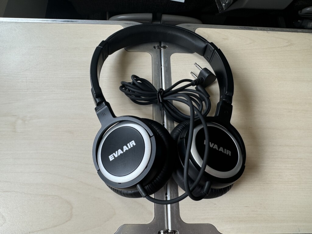 a pair of black headphones on a table