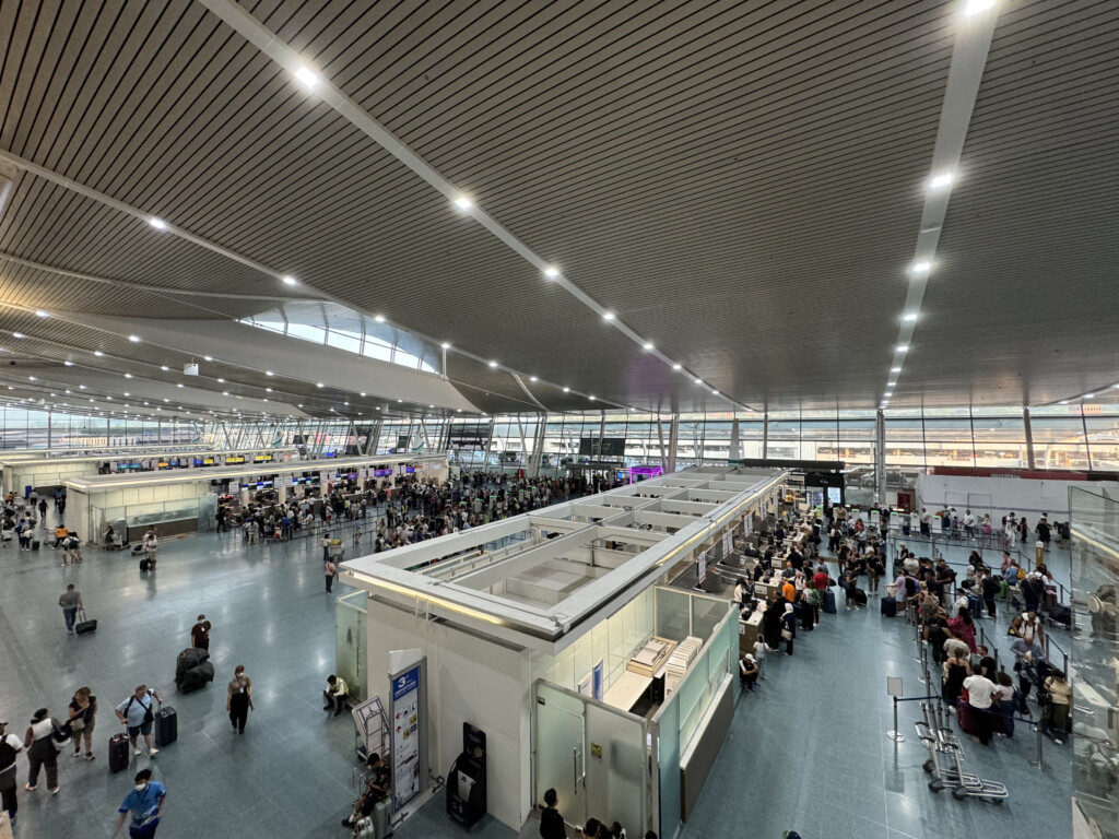 a large group of people in an airport