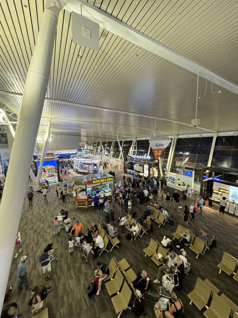 a group of people in an airport