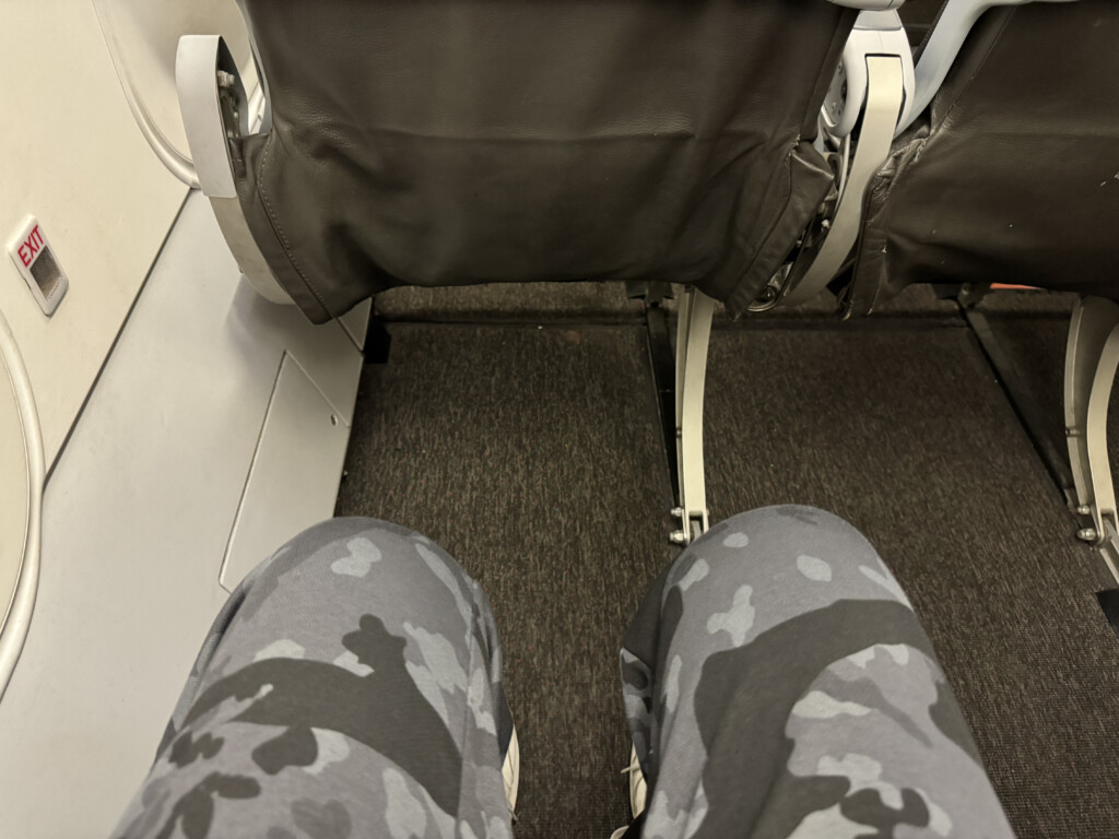 a pair of legs in camouflage pants and pants