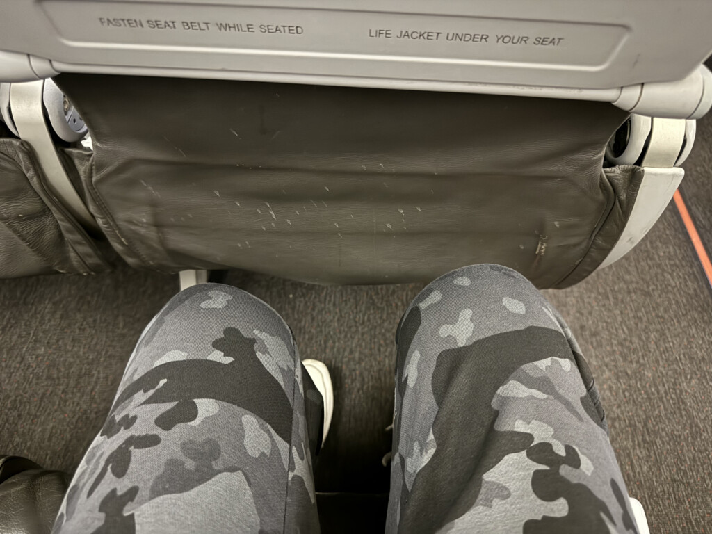 a person's legs in camouflage pants