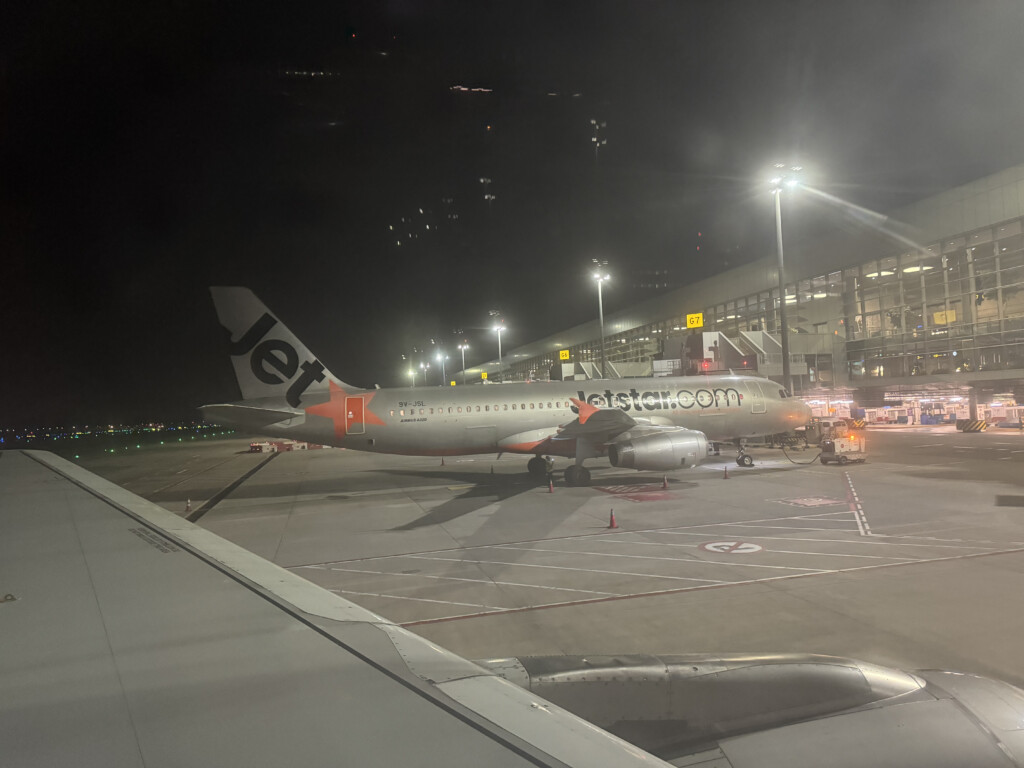 an airplane on the runway at night