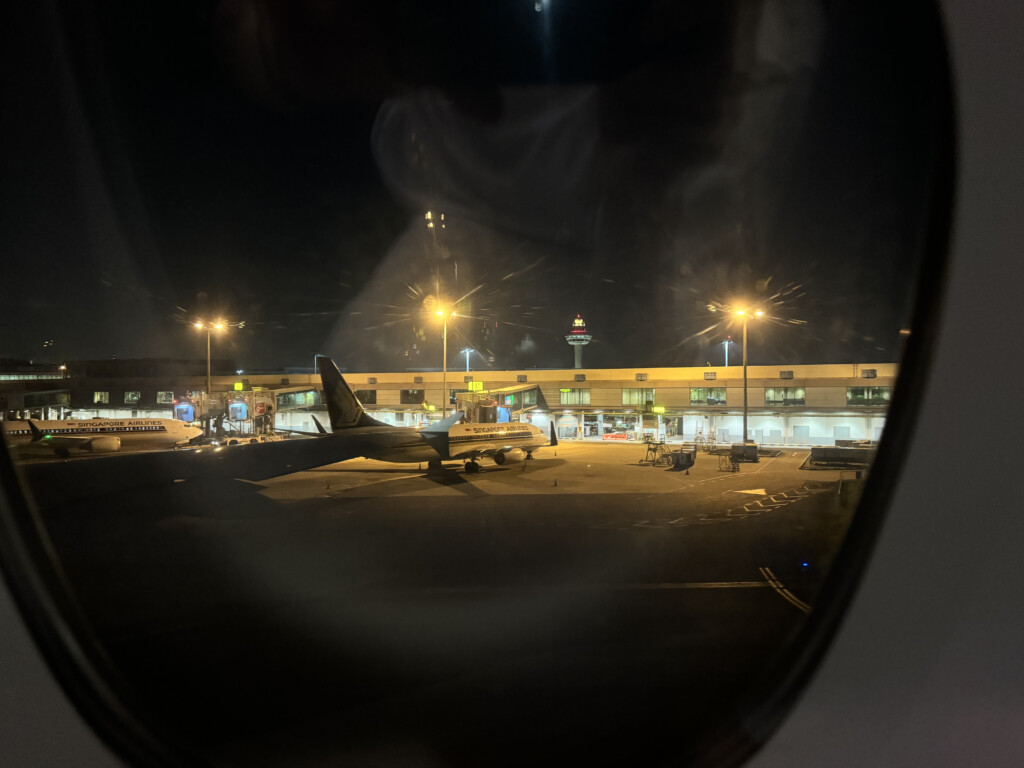 a plane on the tarmac at night