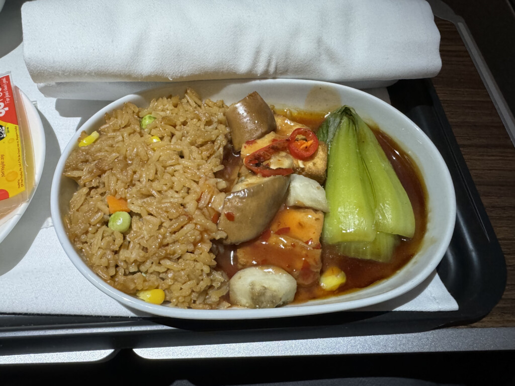 a bowl of food on a tray