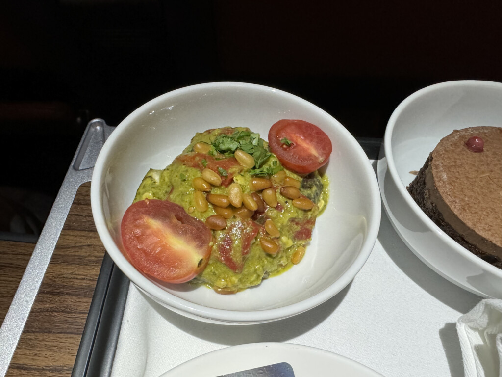 a bowl of food on a tray