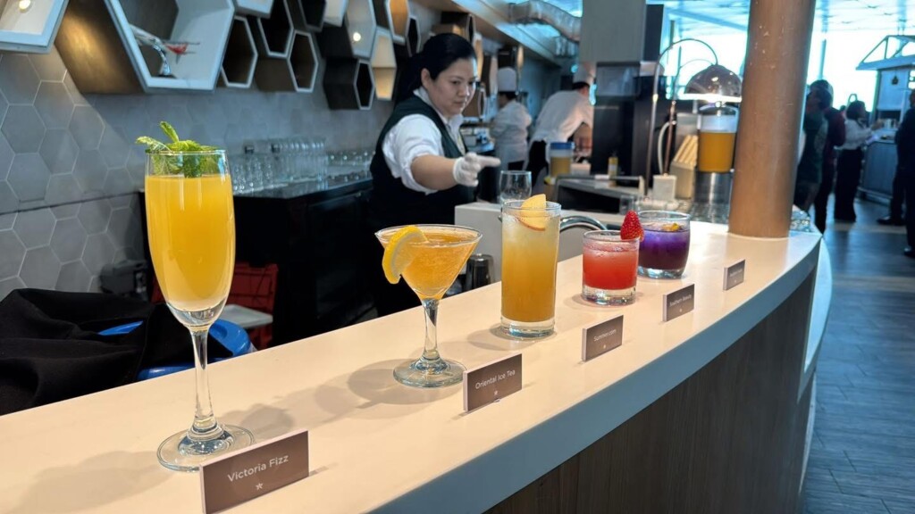 a row of drinks on a bar