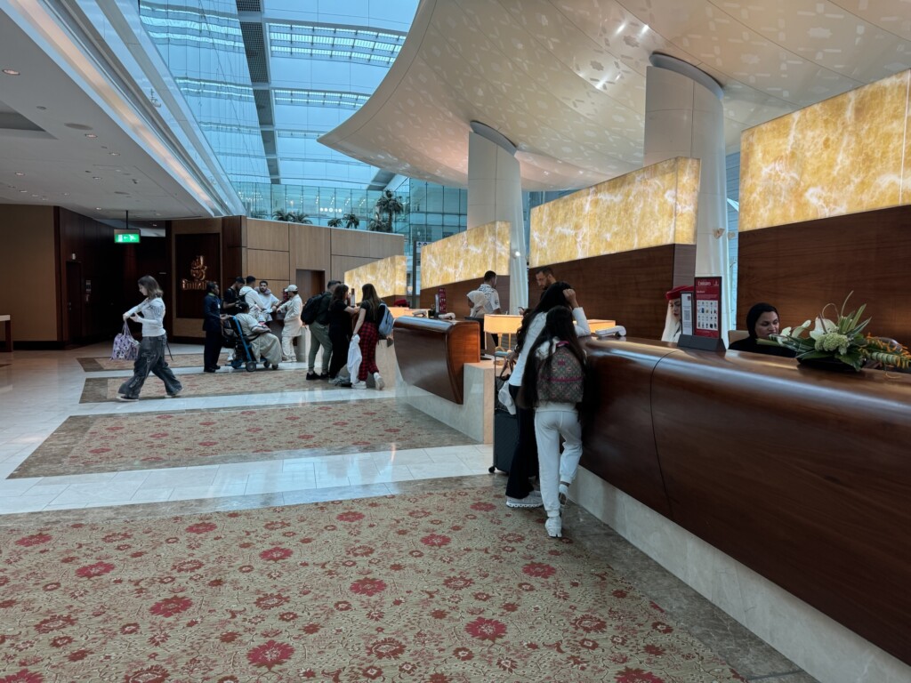 people at a reception desk