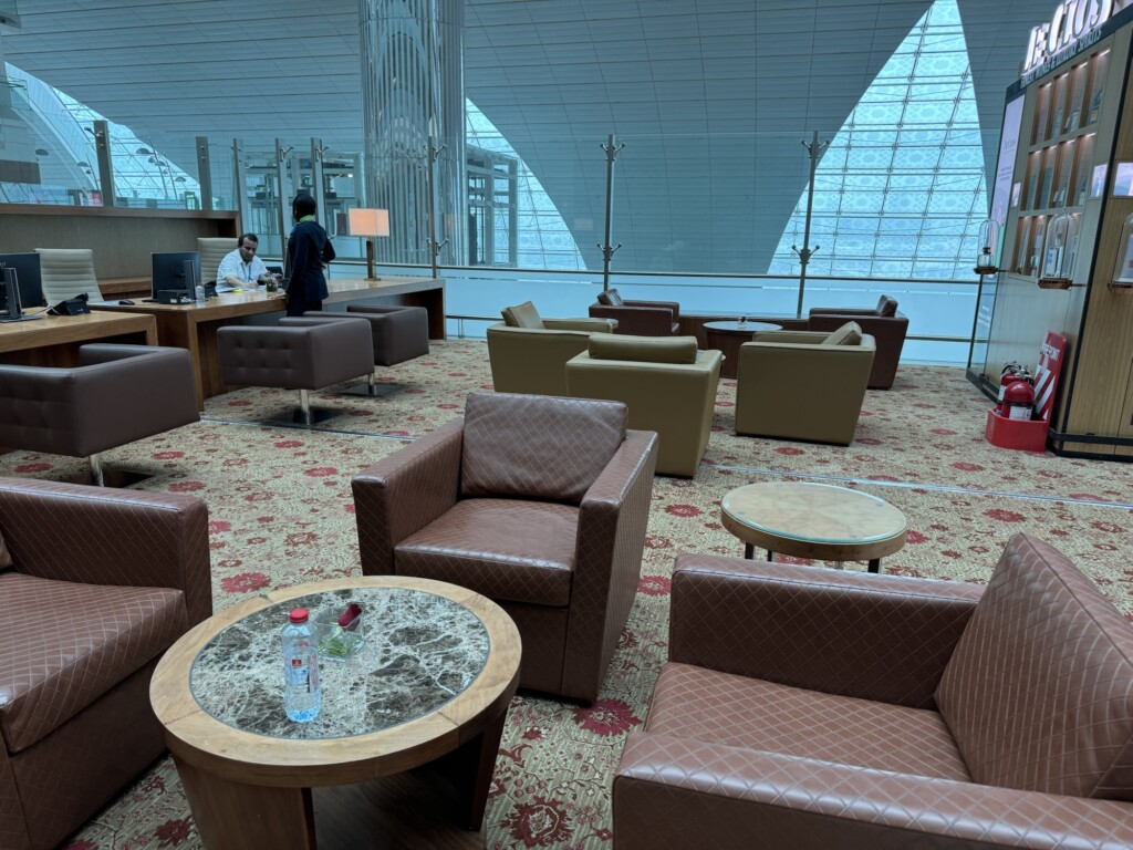 a room with chairs and tables