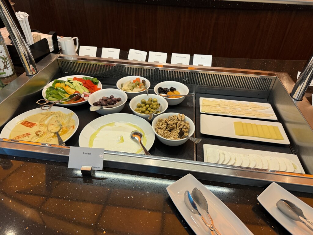 a buffet with different food items on it