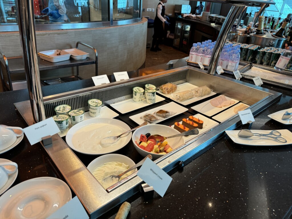 a buffet line with food on it