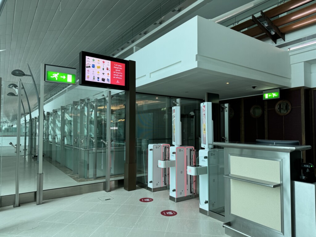 a building with a glass wall and a sign