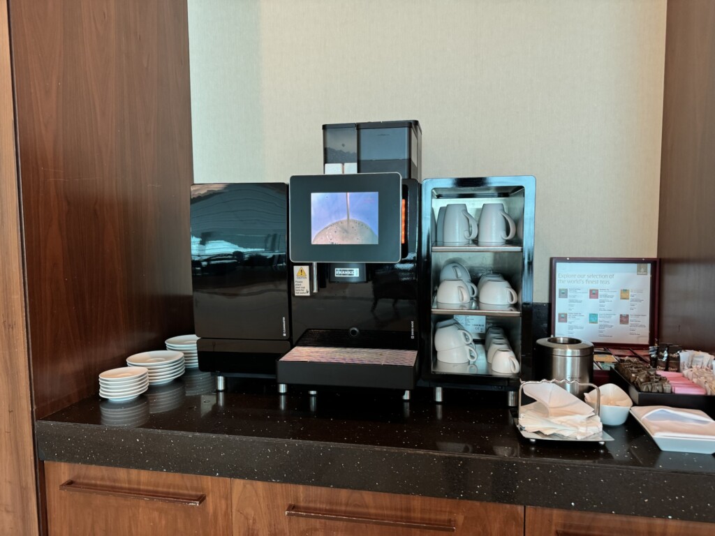 a coffee machine with a screen on it
