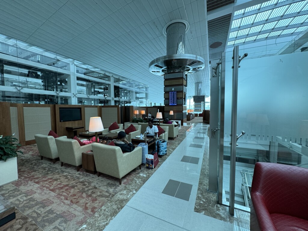 a room with chairs and a large window