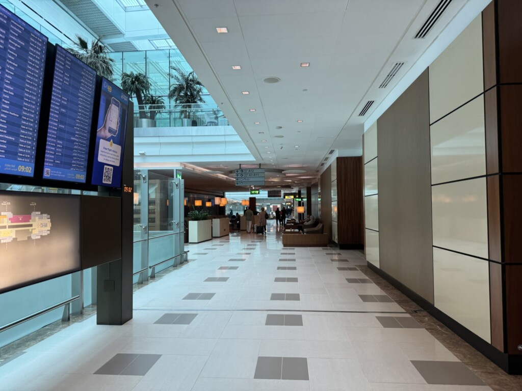 a large hallway with a large screen