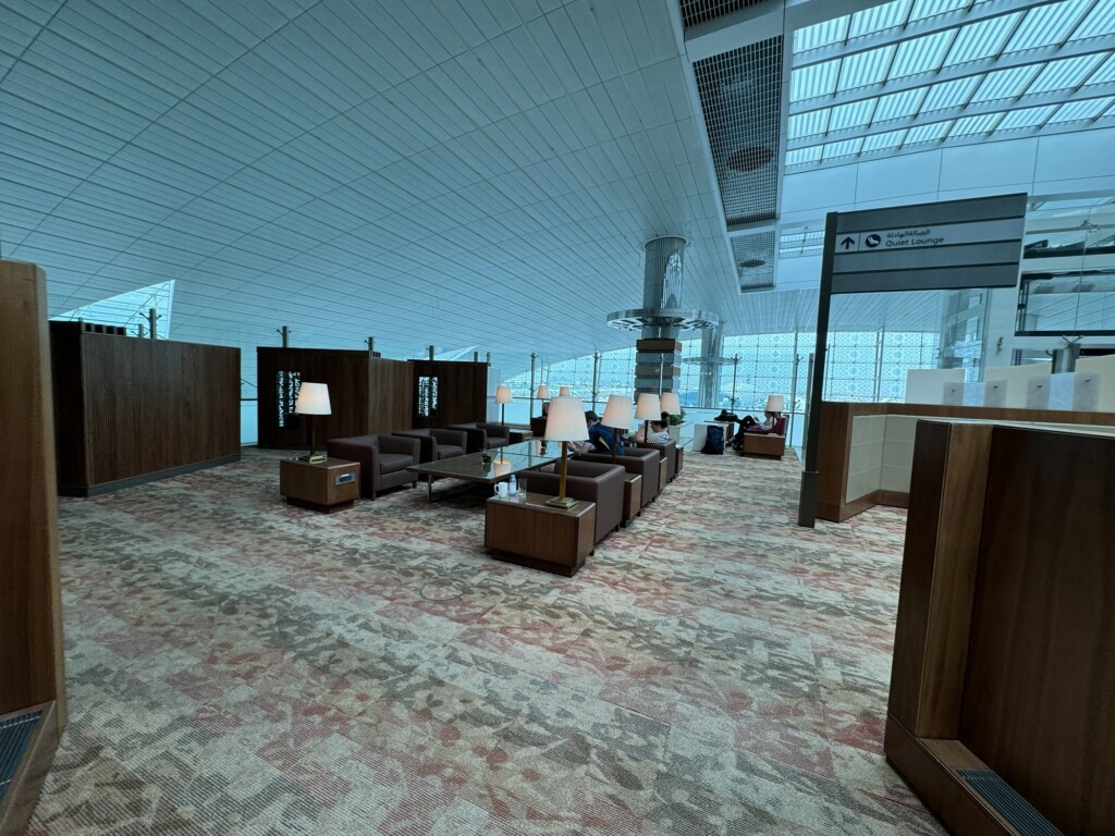 a room with chairs and tables in it