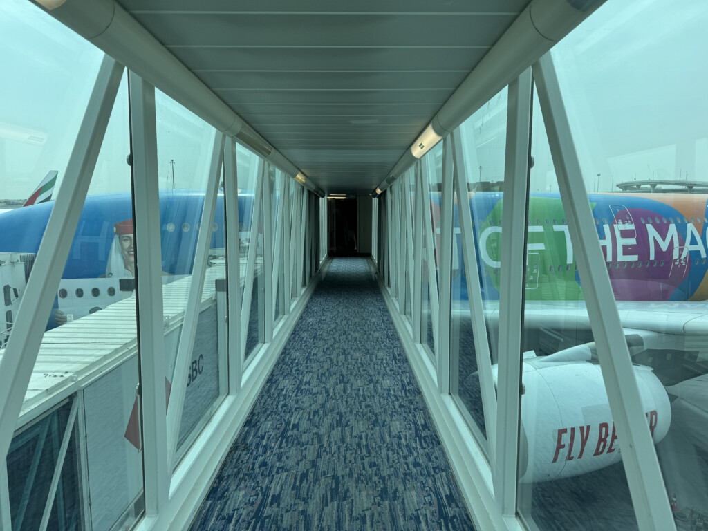 a long hallway with glass windows