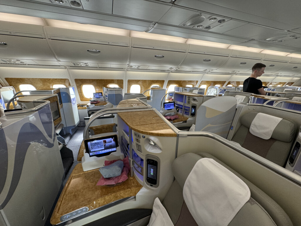 a person standing in the middle of an airplane