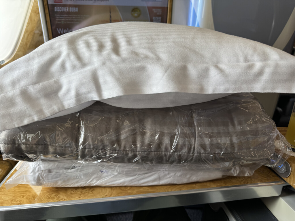 a pillow and pillow in plastic bag