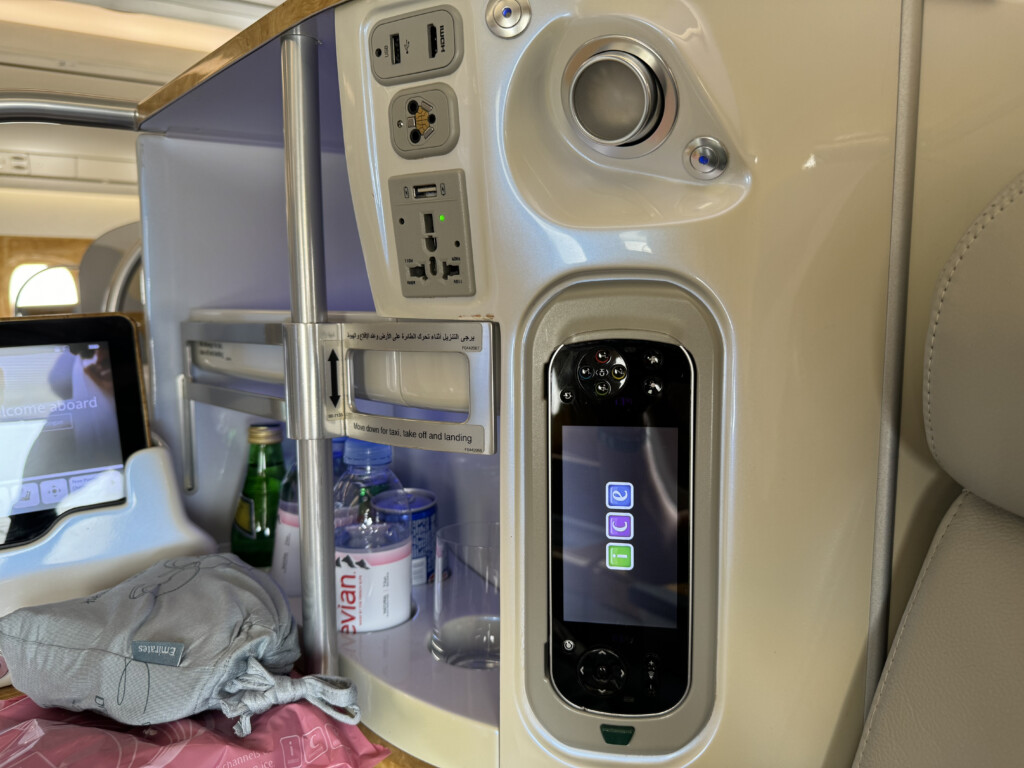 an airplane cabin with an electronic device